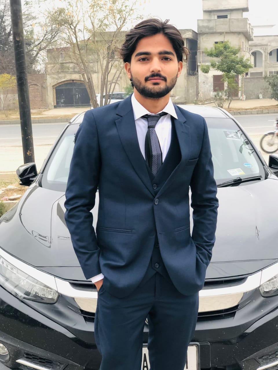Portrait of Qasim Riazat